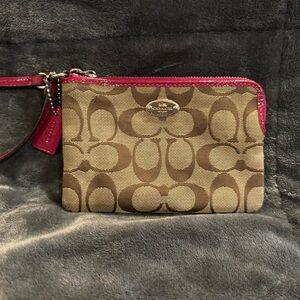 Signature coach wristlet
